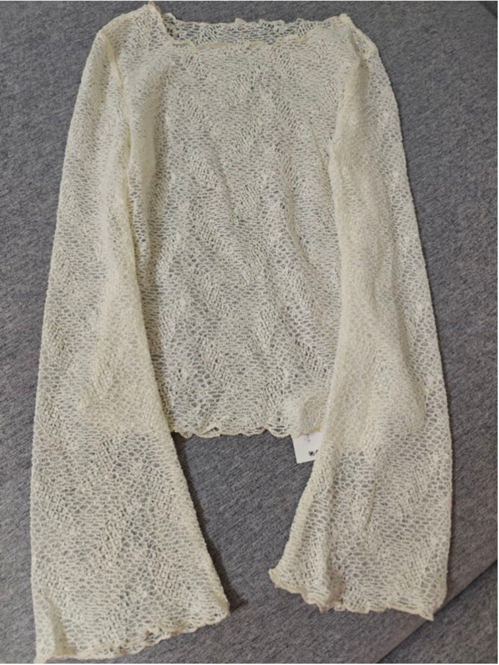 Delicate cream lace knit top